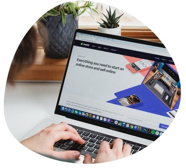 person operating laptop